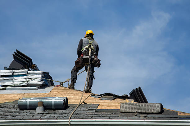 Professional Gutter Installation technician working in Pembroke Pines, FL